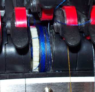 thread_feeder_-_thread_wrapped_around_roller.jpg